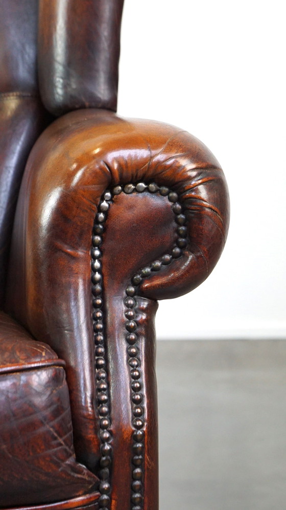 Image 1 of Fauteuil d'oreille en peau de mouton avec coussin d'assise fixe