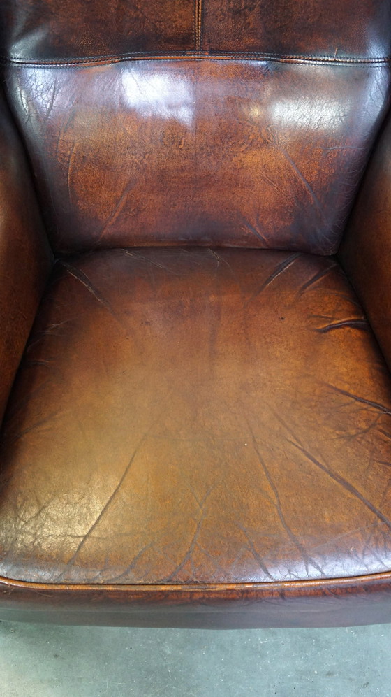 Image 1 of Fauteuil d'oreille en peau de mouton avec coussin d'assise fixe