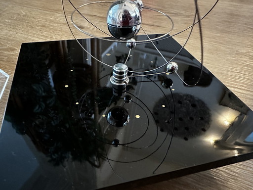 Vintage table clock planetarium solar system