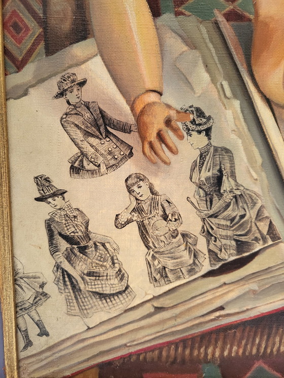 Image 1 of Muñeca sentada sobre un CPA y álbum de moda ilustrado 