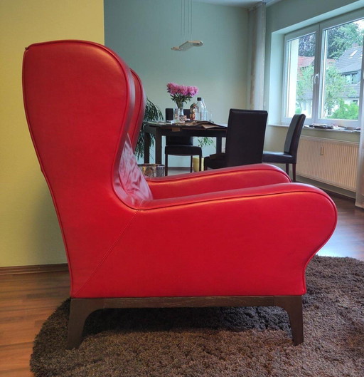 Red Natuzzi leather armchair, "Kristall" model