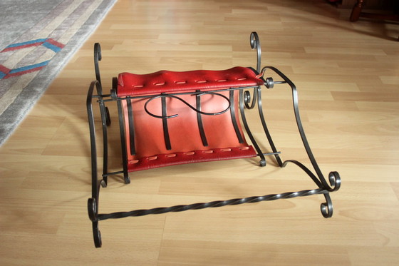 Image 1 of Wrought iron magazine rack with dark red leather, vintage
