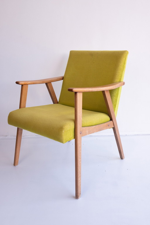 Vintage armchair with lime color rib fabric upholstery