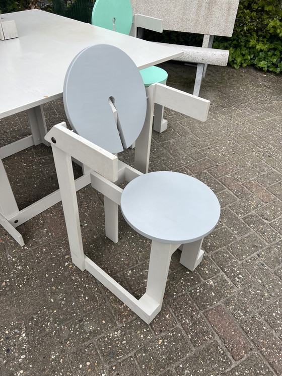 Image 1 of Memphis style table and chairs, Henk Lampe