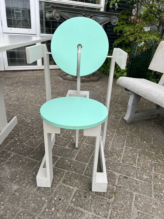 Image 1 of Memphis style table and chairs, Henk Lampe