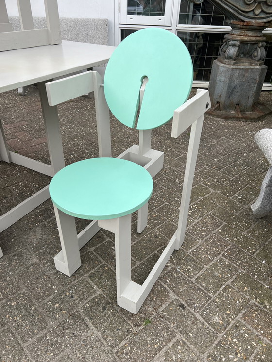 Image 1 of Memphis style table and chairs, Henk Lampe