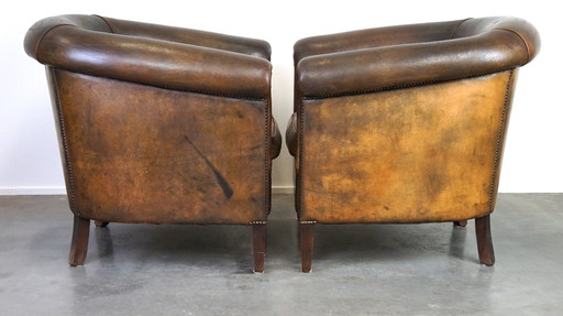 2 x Large and dark sheep leather club chair