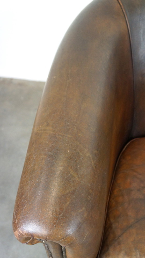 Image 1 of 2 x Large and dark sheep leather club chair