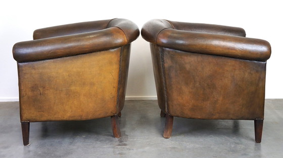 Image 1 of 2 x Large and dark sheep leather club chair