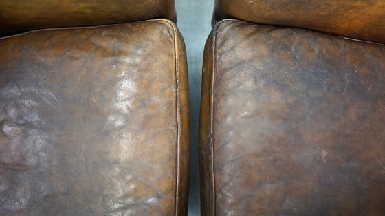 Image 1 of 2 x Large and dark sheep leather club chair