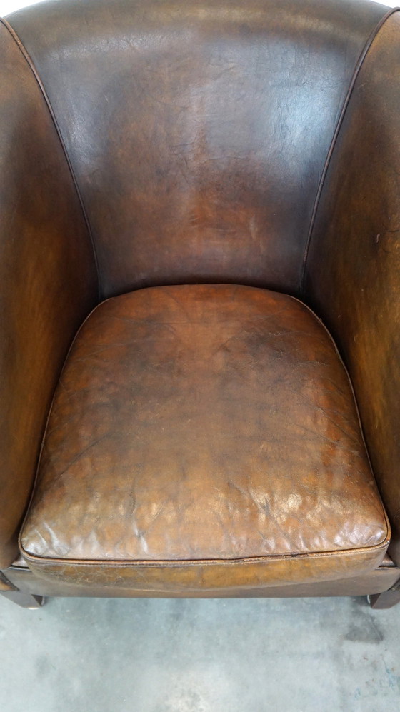 Image 1 of 2 x Grand fauteuil club en cuir de mouton foncé