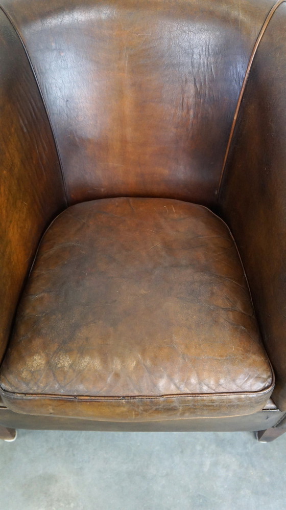 Image 1 of 2 x Grand fauteuil club en cuir de mouton foncé