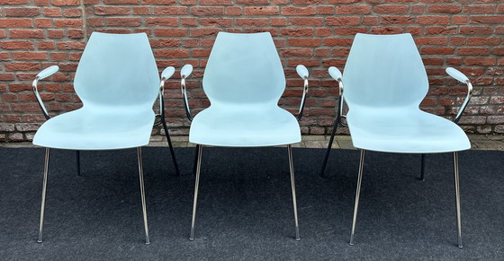 Image 1 of Kartell Maui 3 chairs with armrests.