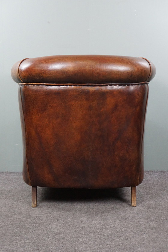 Image 1 of Sheep leather club chair finished with decorative nails