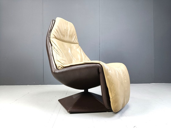 Image 1 of Fauteuil pivotant en cuir vintage avec ottoman, 1970
