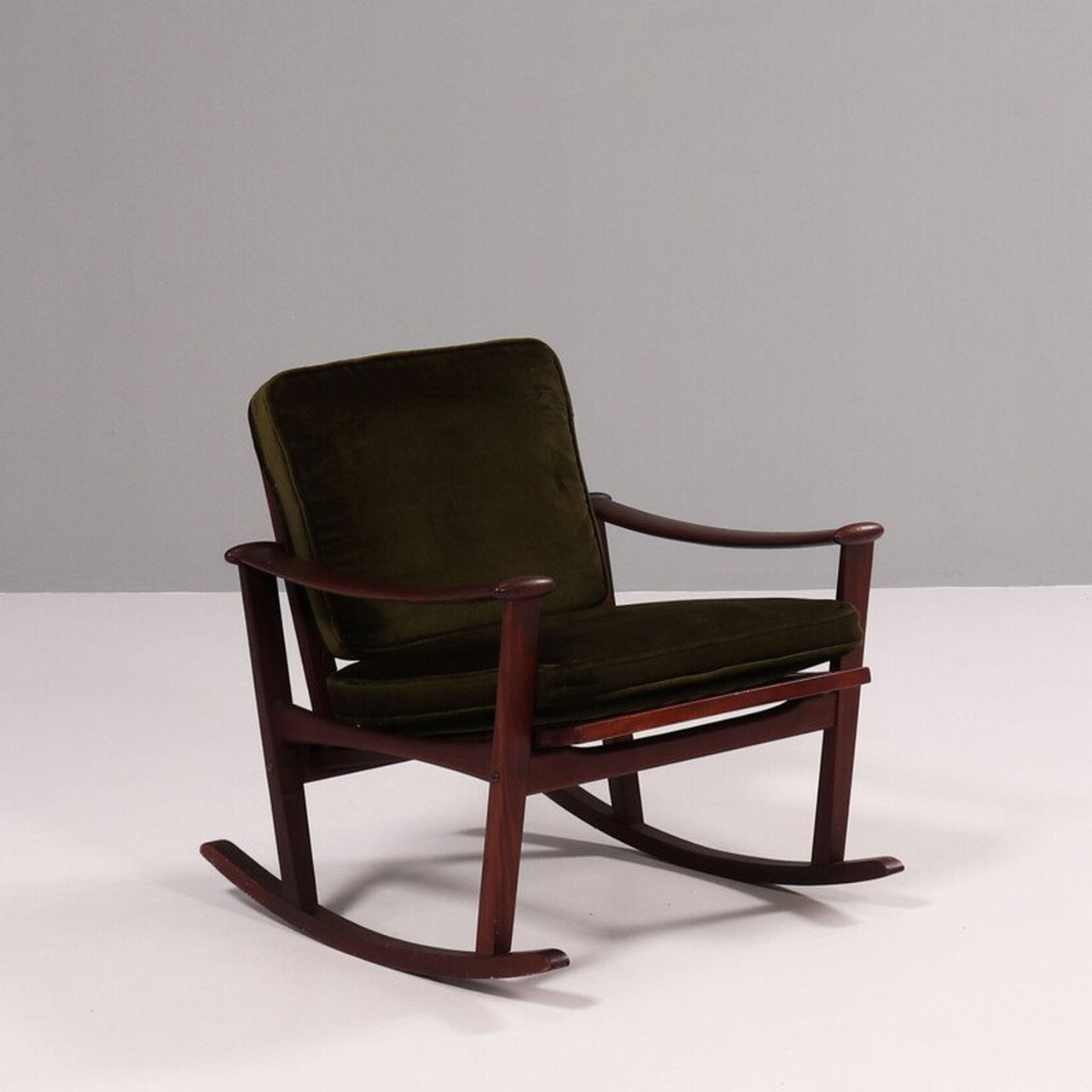 Mid-century teak spade rocking chair by M Nissen for Finn Juhl