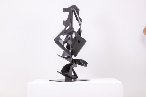 Jean Campa. Vertical sculpture in patinated metal. 1980s.