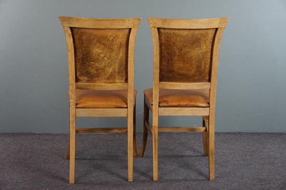 Image 1 of Set of six sheep leather dining chairs with light wood frame