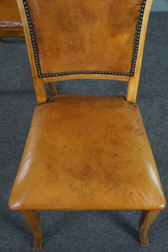 Image 1 of Set of six sheep leather dining chairs with light wood frame