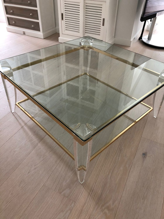 Image 1 of Table basse en verre et laiton