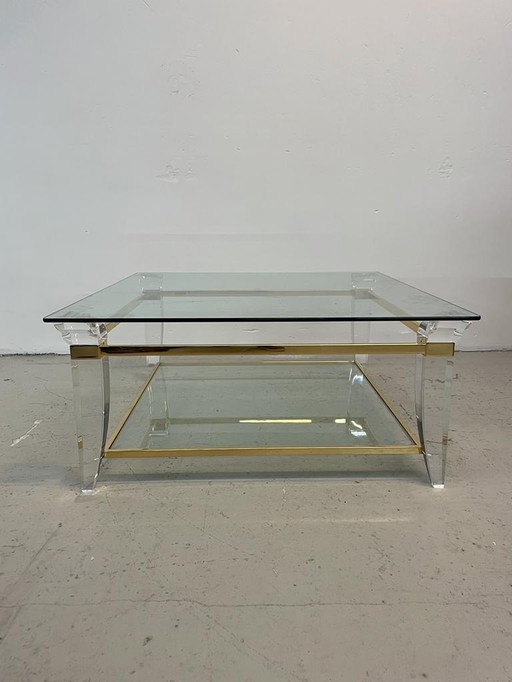 Table basse en verre et laiton