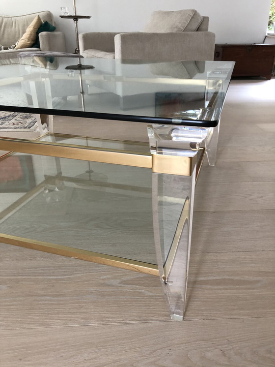 Image 1 of Table basse en verre et laiton