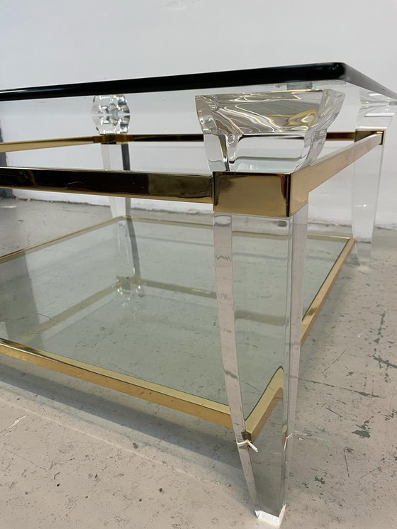 Image 1 of Table basse en verre et laiton