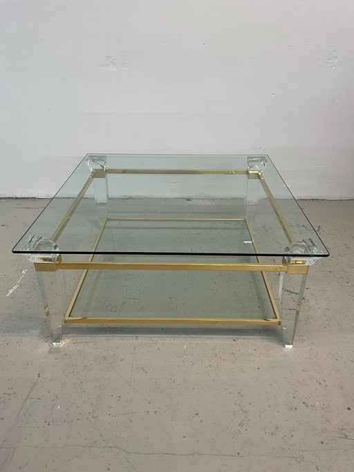 Table basse en verre et laiton