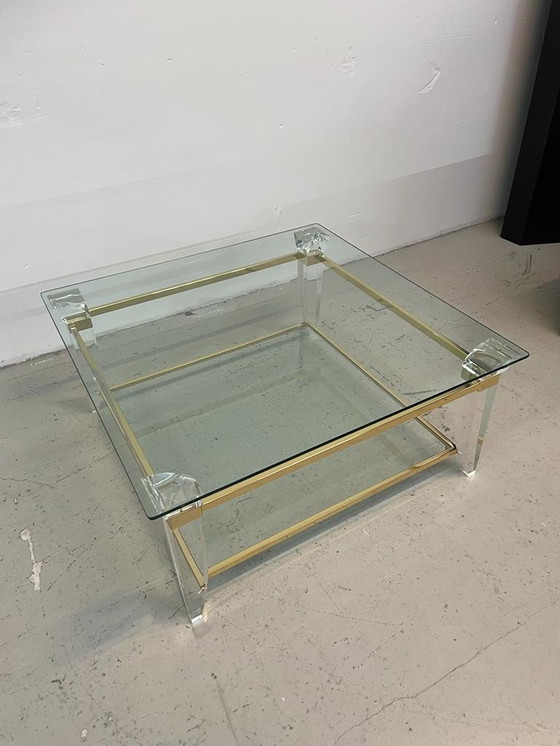 Image 1 of Table basse en verre et laiton