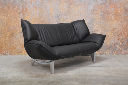 Reupholstered black leather Leolux Tango sofa