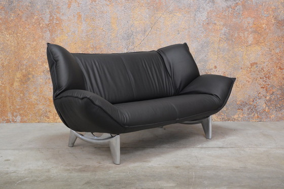 Image 1 of Reupholstered black leather Leolux Tango sofa