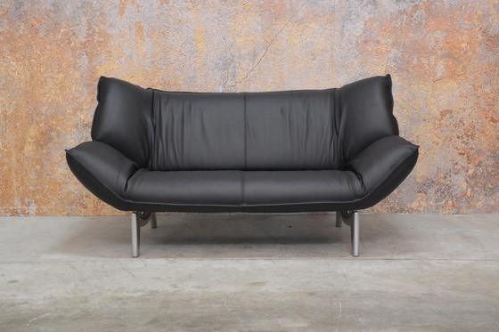 Image 1 of Reupholstered black leather Leolux Tango sofa