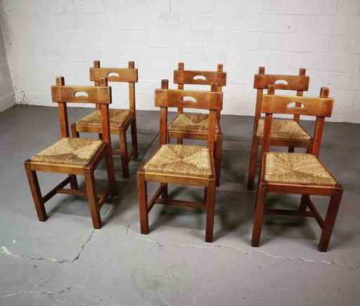 Set of six brutalist, rustic dining chairs