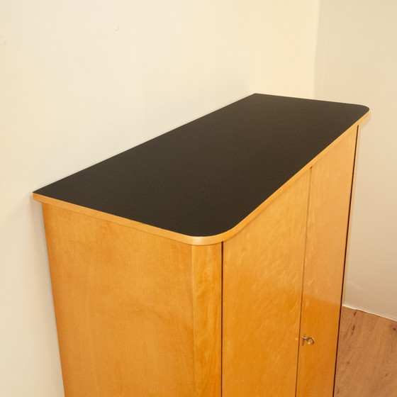 Image 1 of Large chest of drawers, flamed birch with black formica top, 1950s