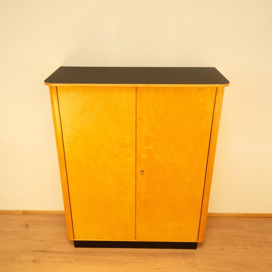 Image 1 of Large chest of drawers, flamed birch with black formica top, 1950s