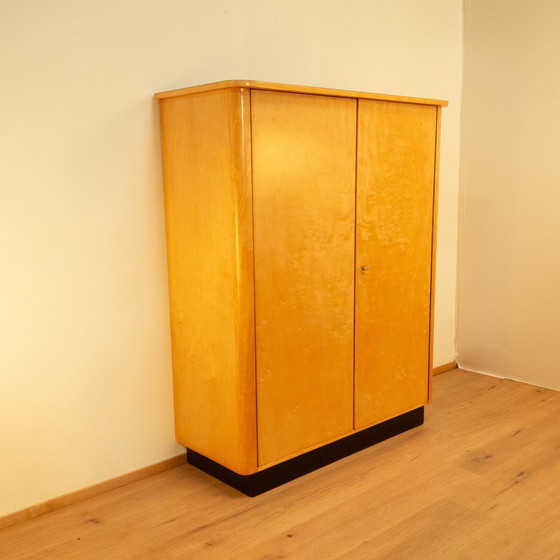 Image 1 of Large chest of drawers, flamed birch with black formica top, 1950s