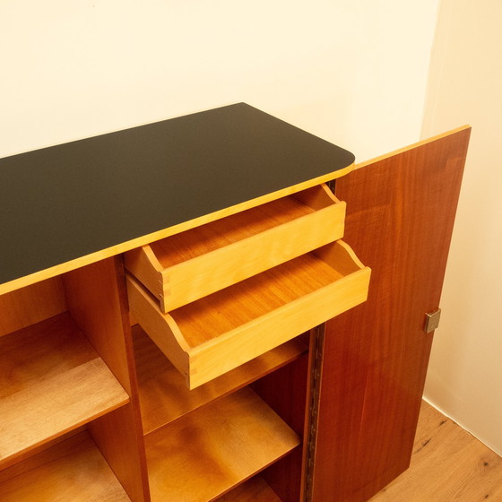 Image 1 of Large chest of drawers, flamed birch with black formica top, 1950s