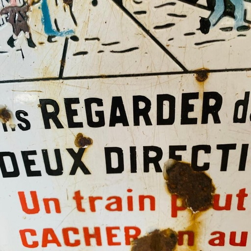 Letrero esmaltado vintage "No cruzar un tren puede ocultar otro", 1930