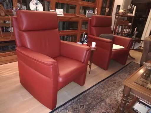 2x Modern red leather fauteulis