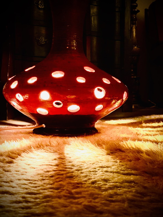 Ceramic lamp with holes top