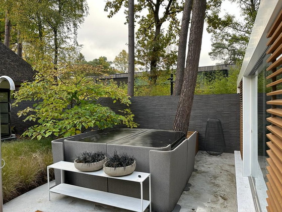 Image 1 of Paola Lenti screens around jacuzzi