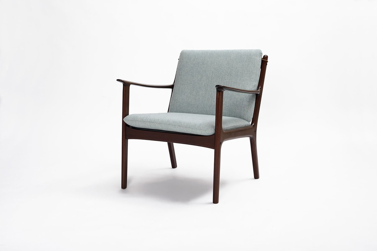 Sillón PJ112 diseñado por Ole Wanscher para Poul Jeppesen