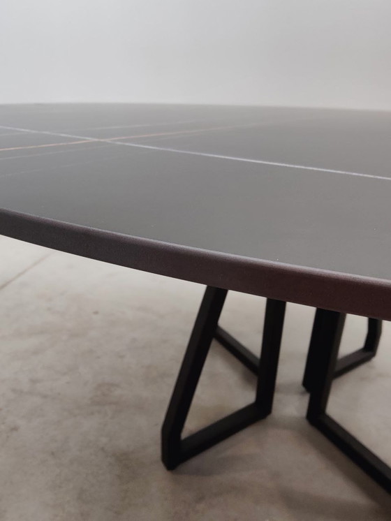 Image 1 of Round dining table with black ceramic top