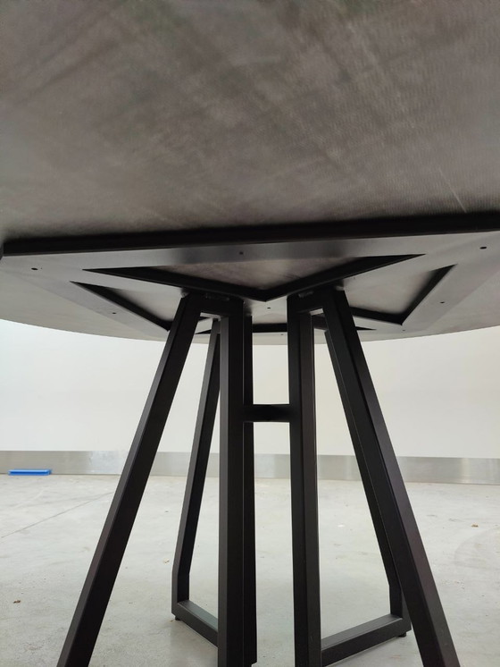 Image 1 of Round dining table with black ceramic top