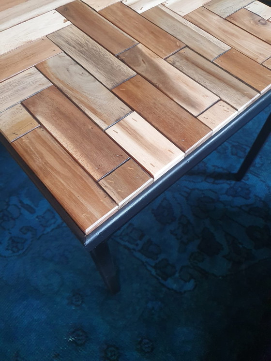 Image 1 of Coffee Table With Black Metal Frame And Inlaid With Reclaimed Wood In A Playful Motif