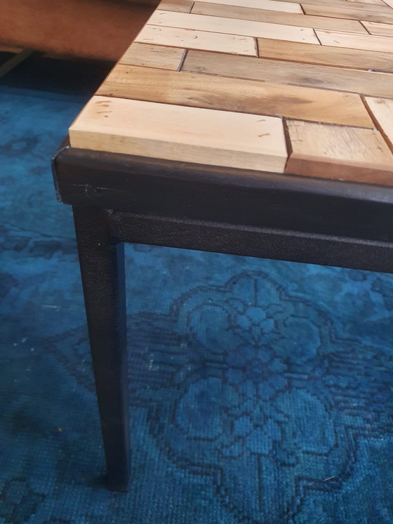 Image 1 of Coffee Table With Black Metal Frame And Inlaid With Reclaimed Wood In A Playful Motif