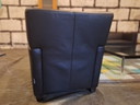 2x black leather Linteloo Marconi armchairs with footstool