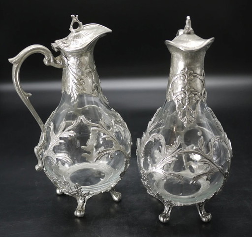 Pair of Blown Glass and Silvered Pewter Ewers in the Louis Xv Style.