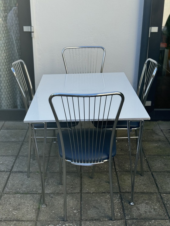 Image 1 of Fritz Hansen Table and 4x Nowy Styl Dining Chairs