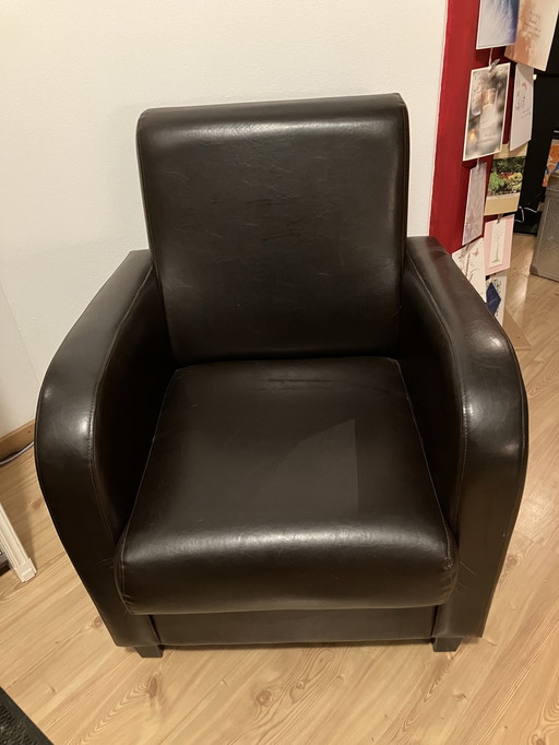 2x Brown leather club chairs